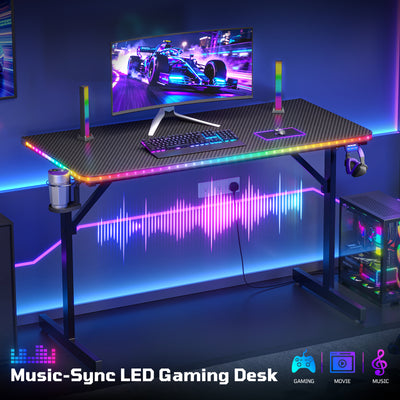 RSPGAME 43.5" Music Sync Gaming Desk, Ergonomic Gamer Table, ,T-Shape PC Computer Desk with RGB Lighting, Carbon Fiber Black